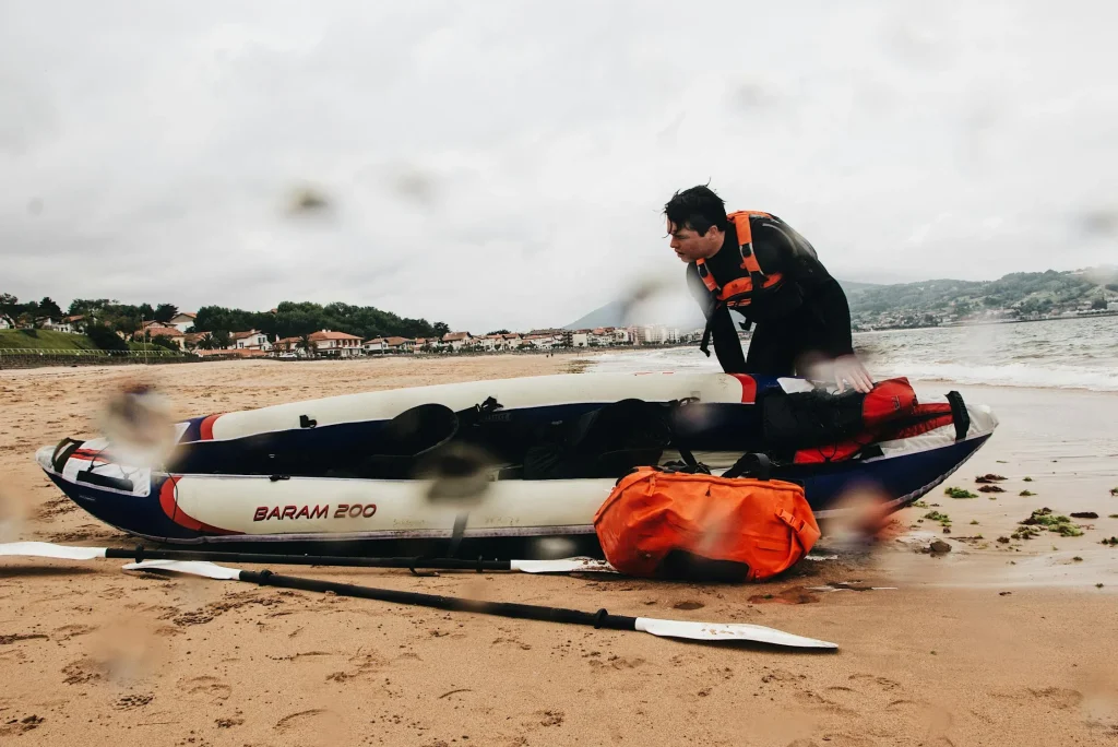 Inflatable kayak on water showing portability and performance