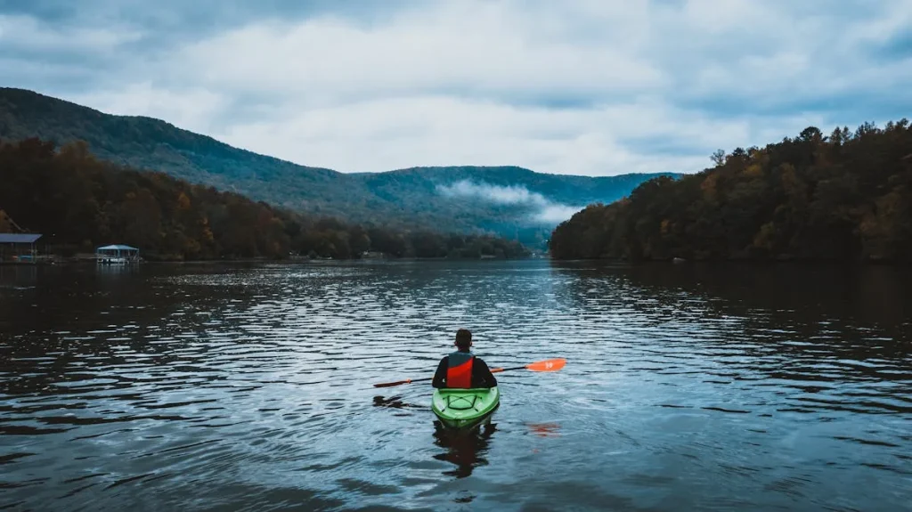 Kayak on a peaceful UK lake surrounded by nature