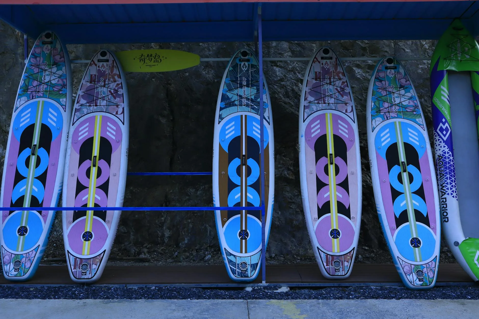 Different paddleboard shapes and types on display