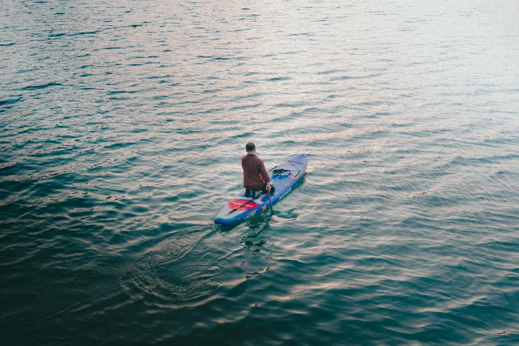 Stand up paddleboard on a calm UK lake