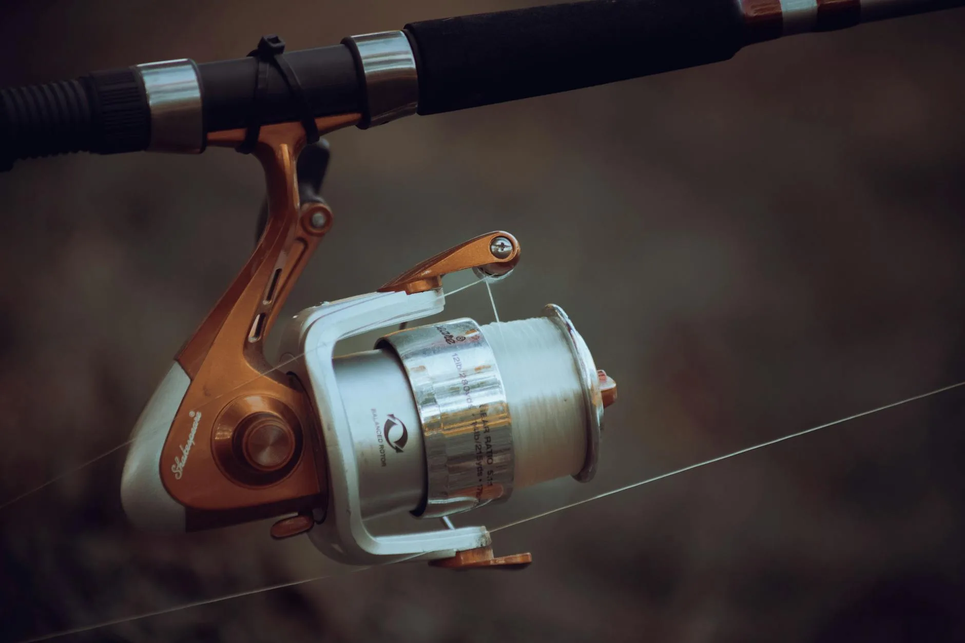 Fishing rod and reel ready for a paddleboard session