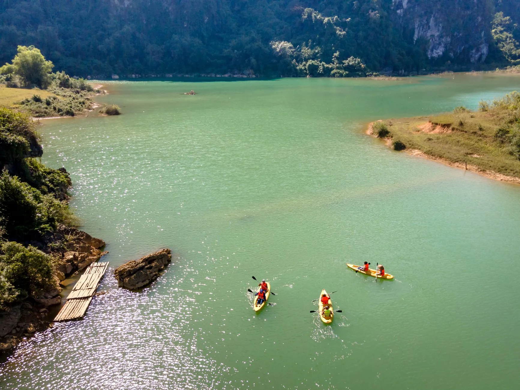 Kayaker pausing on calm water during a practice session